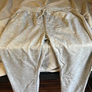 Stacked grey drawstring waist sweat pants